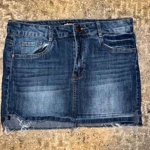 Dollhouse jean skirt, very stretchy. Size 13 but fits like a 10.